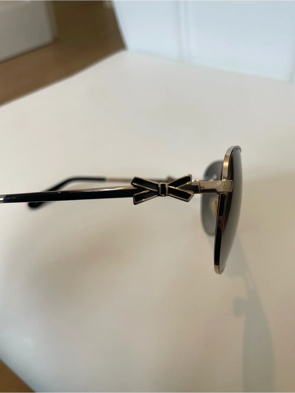 kate spade stylish gold hinges